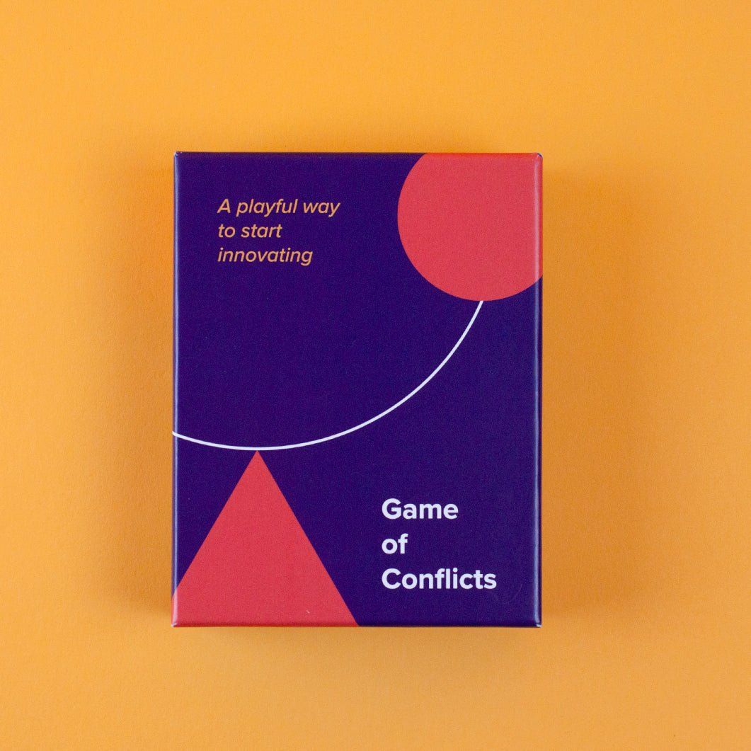 Game of Conflicts card box on a yellow background